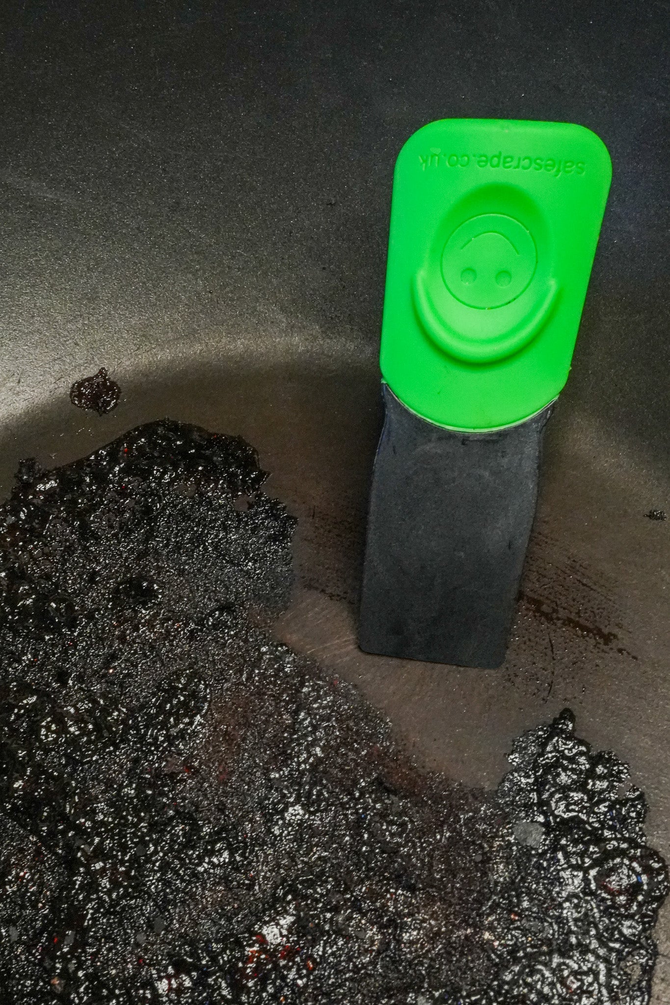SafeScrape non-scratch scraper cleaning burnt pan without scratching